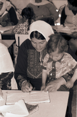 A Mother and her Child Attending one of the Literacy Classes 