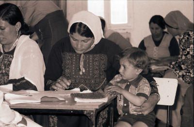 A Mother Accompanied by her Child During One of the literacy Classes 