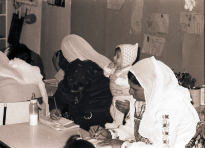 Women Receiving Education During Literacy Classes  