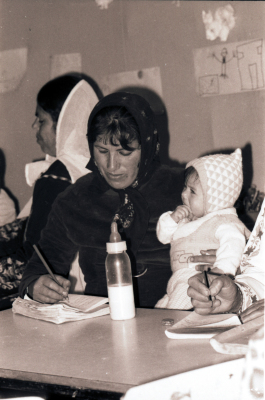 A Mother and her Child Attending one of the Literacy Classes 