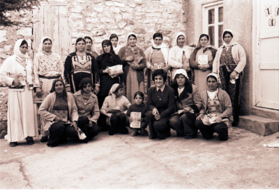 A Group Photograph of One of the Literacy Classes Female Students Accompanied by their Teacher 