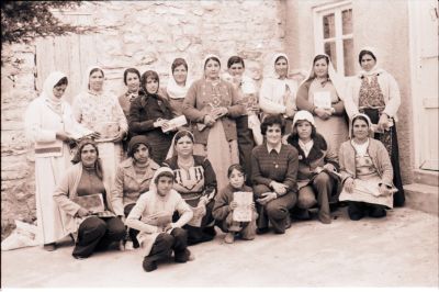 A Group Photograph of Female Students During One of the Literacy Classes Accompanied by their Teacher 