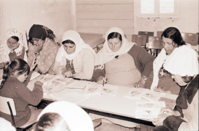 Women and Young Women Receiving Education During One of the Literacy Classes 
