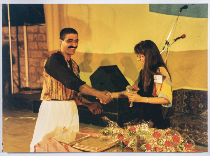 The participation of the Palestinian folklore band in its show in Marj Ben Amer at the Palestine Festival in Birzeit 1993