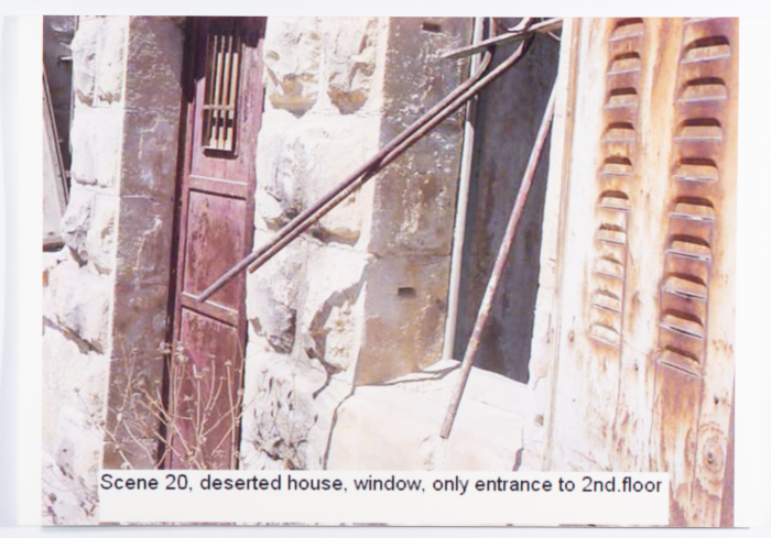 The entrance to an old deserted house