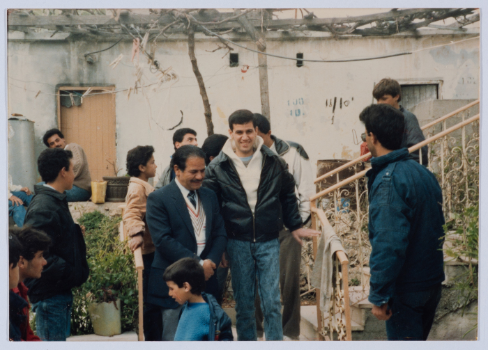 Mohammad Abu ʿaker and his Father After his Treatment 