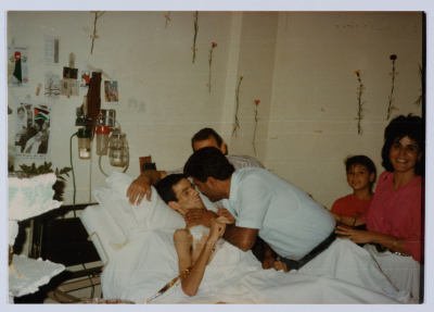ʿatef and Khawla Abu ʿaker visit the Shaheed Mohammad Abu ʿaker at al-Makassed Hospital 
