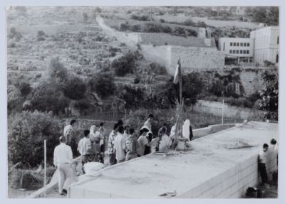 Placing a Flag Atop the Shaheed