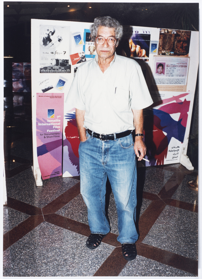 A photograph of the late Palestinian director Mustafa Abu Ali at the 7th Ismailia International Film Festival