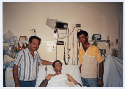 The Shaheed Mohammad Abu ʿaker in the Hospital with his Father and his Brother 