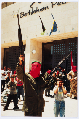 A Masked Man During a March Led by the Popular Front for the Liberation of Palestine in Bethlehem 