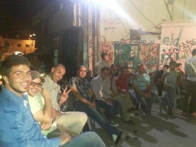 A Photograph of a Group of Young Palestinian Men in Dheisheh Refugee Camp