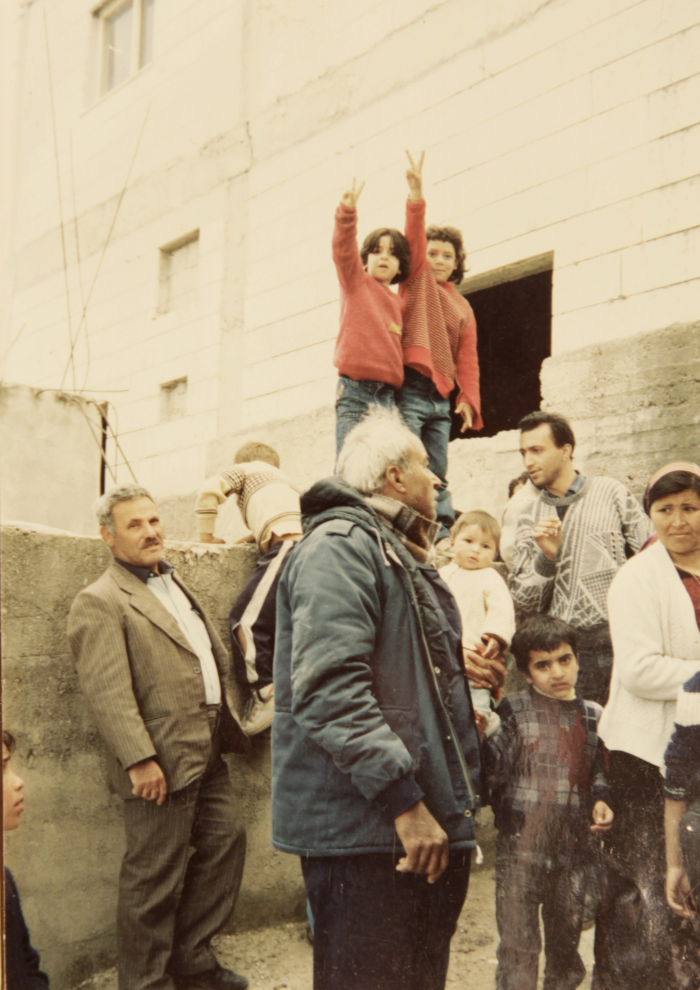 A Photograph of a Gathering in Dheisheh Refugee Camp to Welcome Back the Shaheed Muhammad abu Aker 