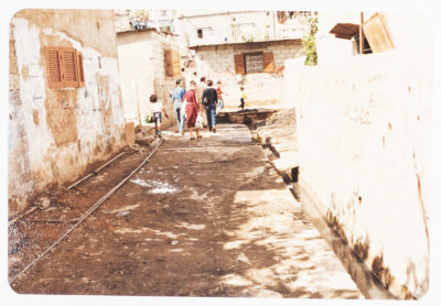 A Group of People walking in one of the Routes inside Burj Al Barajneh Refugee Camps 