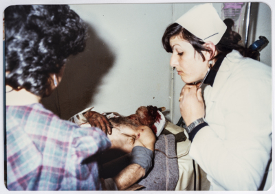 Providing First Aid Treatment to a Casualty, Tripoli- Lebanon, 1983- 1985