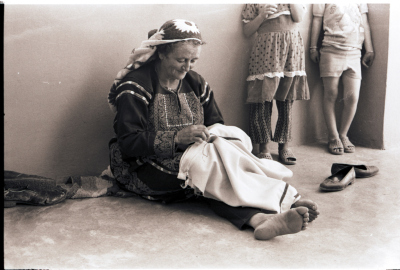 Fatima Yousef Sewing a Palestinian Thobe, Kobar-Ramallah, the 1970s 