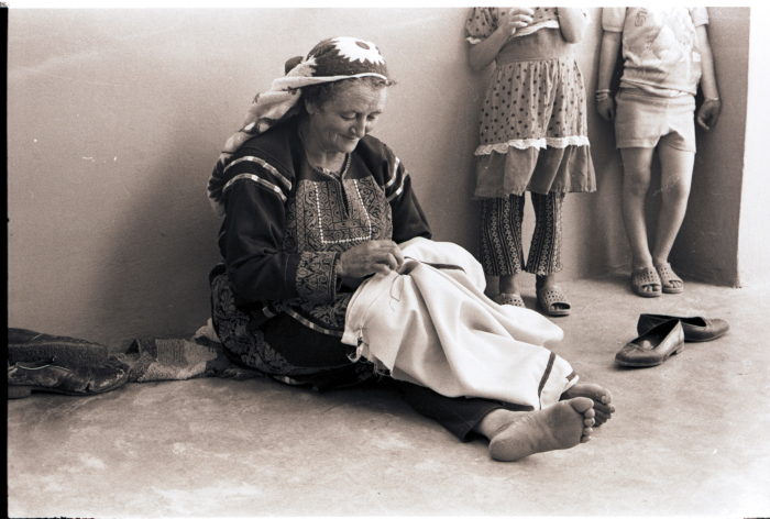Fatima Yousef Sewing a Palestinian Thobe, Kobar-Ramallah, the 1970s 