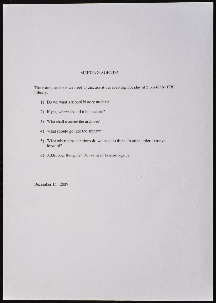 Document on the agenda of a meeting regarding the school archives