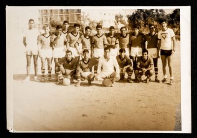 Mahmud Jidah with the YMCA Football Team 