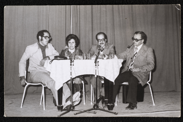 A Photograph of Mohammad Batrawi with Others at a Symposium on International Workers' Day at the Bishop Hall, al-Quds, 1977