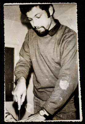 Taysir Barquny Preparing Food for His Guests at His House in Amman
