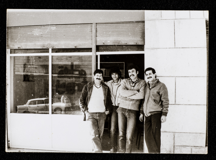 A Photograph of Men outside the Shuruq Printing Press in al-Bireh, 1981