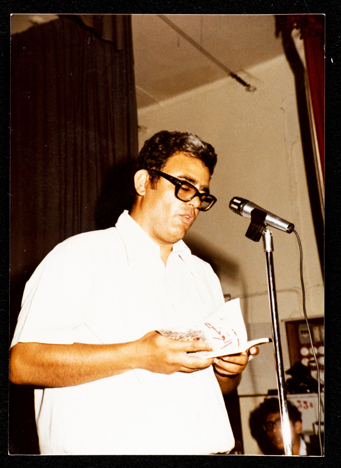 A Photograph of Mahmud ʾAyyub Reciting His Poetry at the GUPW in Gaza, 1980-89