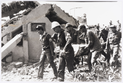 Carrying Victims of the Israeli Air Raid on Hammam Chott City, 1985