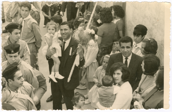 A man holding a baby girl