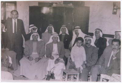 A Photograph of Men and Children 