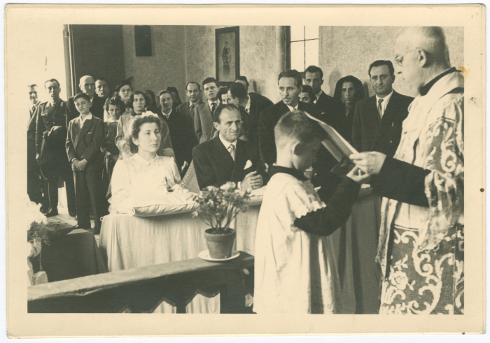 A Photograph of a Wedding at a Church 