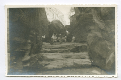 Girls During a Trip Between Rocky Cliffs