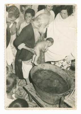 A child being baptized of