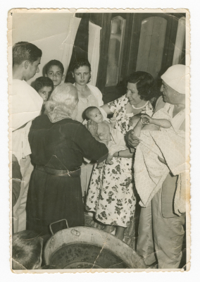 Relatives during the baptism of a child