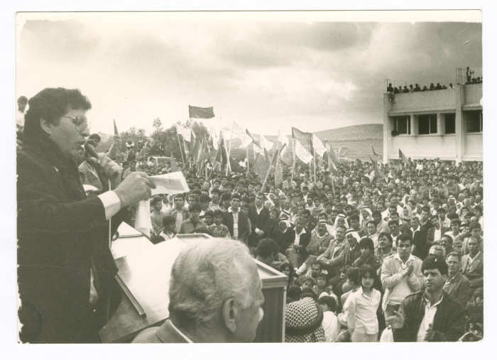 Saméh al-Qassim giving a speech