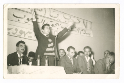 Saméh al-Qassim giving a speech