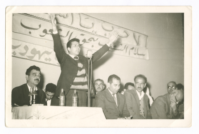 Saméh al-Qassim giving a speech