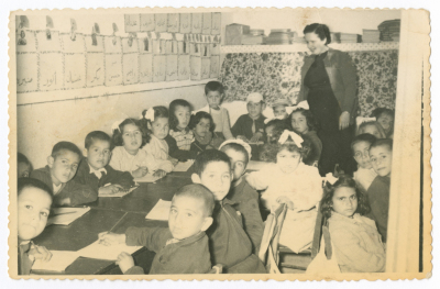 A girl from Khateb Family with her classmates
