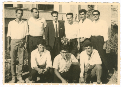 Men at a wedding ceremony for a member of Khateb Family in Arraba