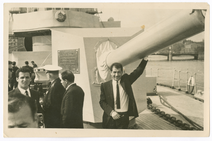 A man from Khateb Family in front of  Ararat's; warship, cannon