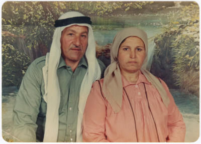 A married couple from Qarawat Bani Zaid in a studio