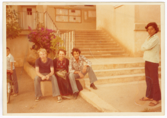 A child from Shalaby Family with other children in the school yard
