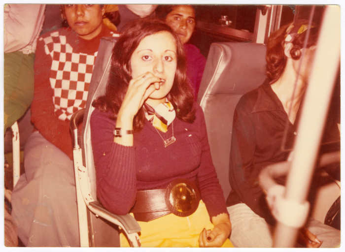 A woman from Faysal Family on the bus