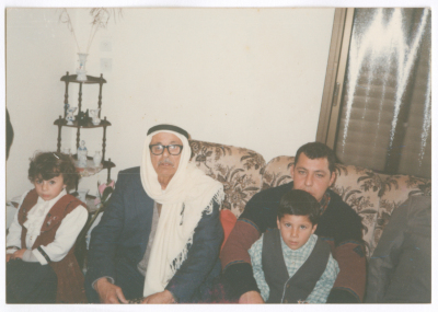 A man from Darawsheh Family with his grandkids