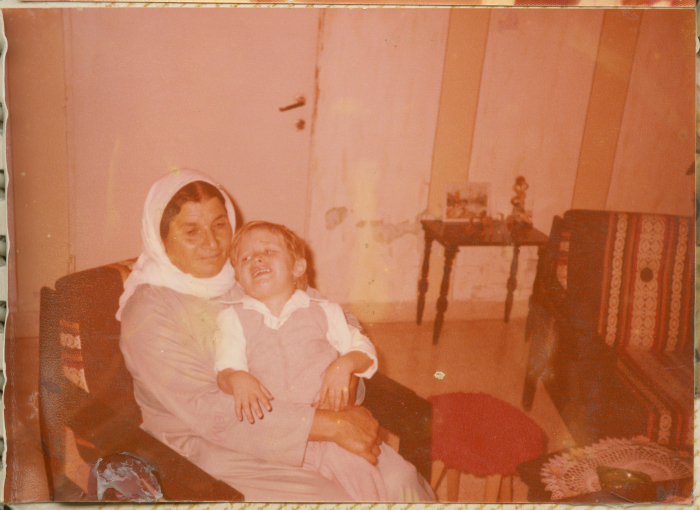 A woman from Shalaby Family holding Ameer Mohammad Shalaby
