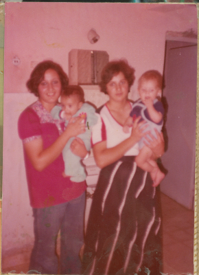 Sisters from Shalaby Family holding Mohammad