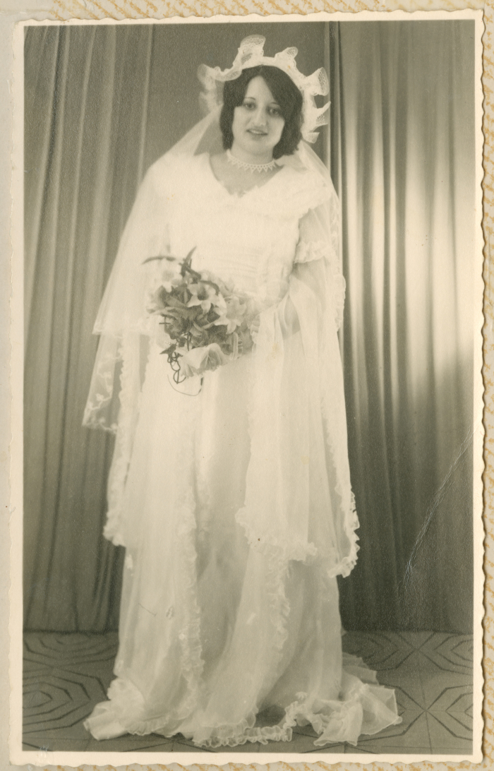 A woman from Shalaby Family in her wedding dress