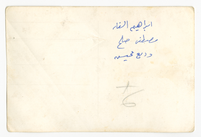 A photograph of men at a Palestinian Bus Company