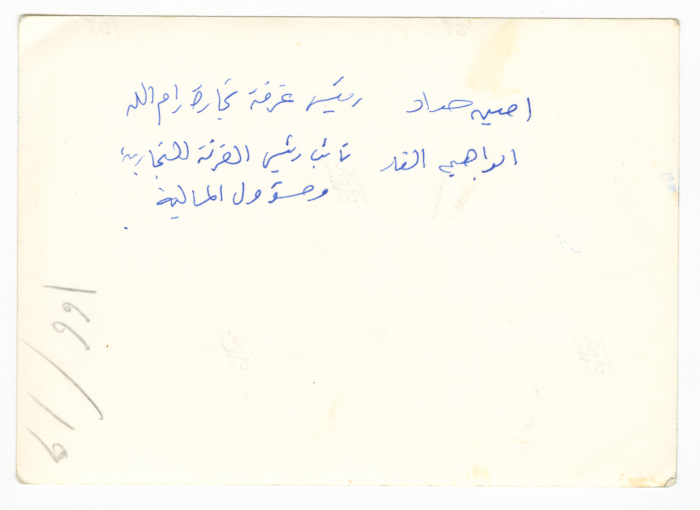 A photograph of men having a discussion