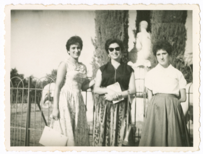 Two sisters from Abu Ghazaleh Family with a woman from Abu Aker Family in a park in Egypt